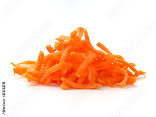 Pile of fresh organic shredded carrots. Raw grated carrots isolated on white with clipping path.