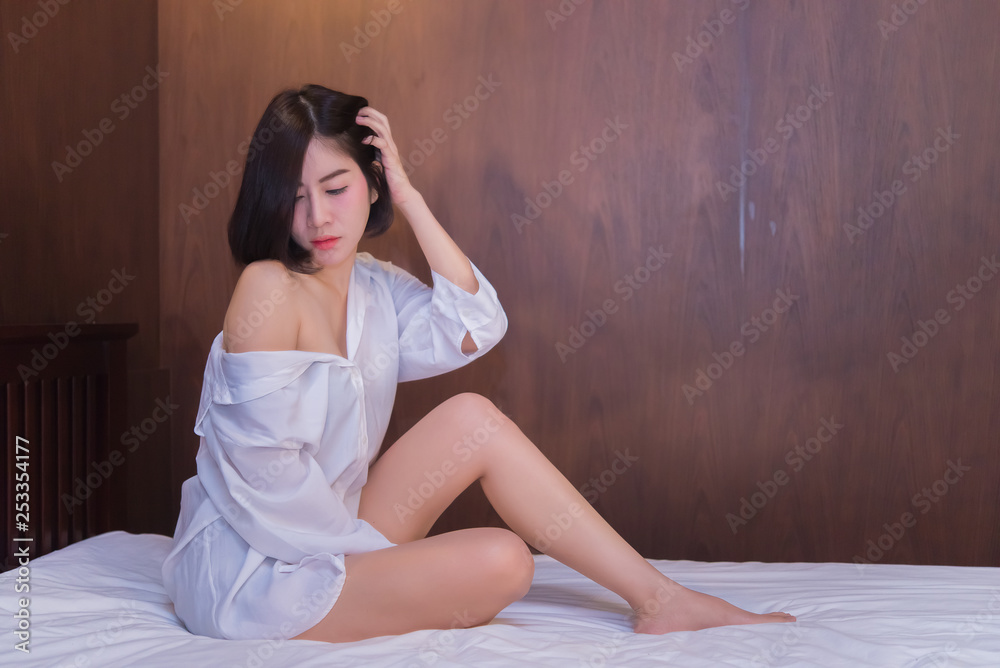 Portrait of beautiful asian sexy woman in the bedroom,Thailand people,Pose for take a picture, Portrait of beautiful asian sexy woman in the bedroom,Thailand people,Pose for take a picture,