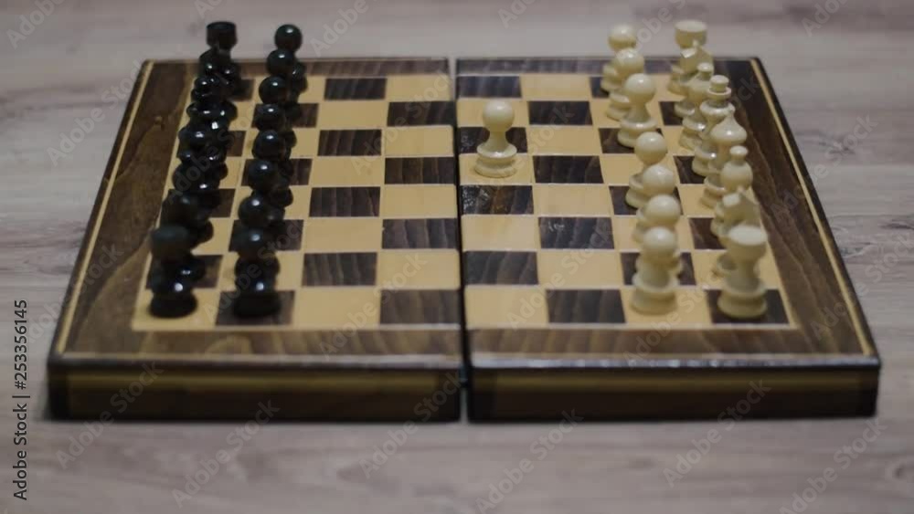 Two people playing chess, artistically shot with shallow depth of field Two people playing chess, artistically shot with shallow depth of field