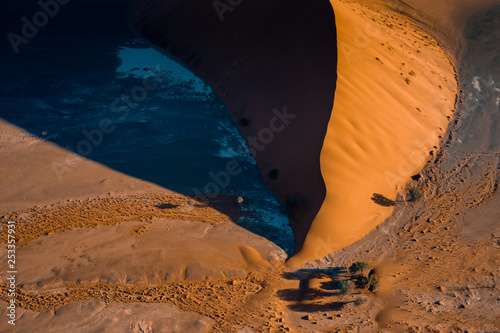 Huge sand dune in Sossusvlei National Park in Namibia at Sunset