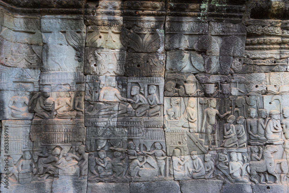 Relief on the wall of gallery of Bayon temple in Angkor Thom. Cambodia