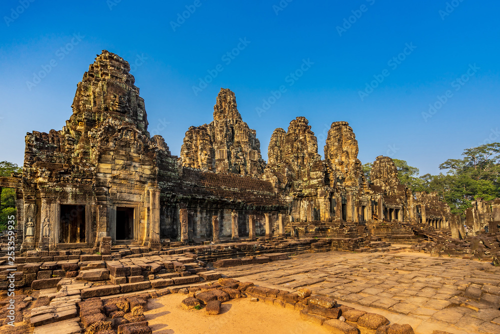 Naklejka premium Bayon temple in Angkor Thom, Cambodia: first enclosure wall, galleries and face towers.