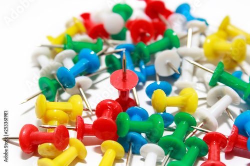  Colorful pushpins on white background