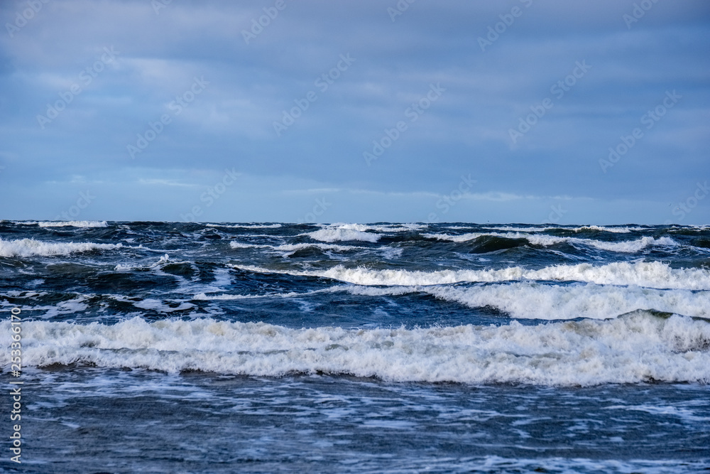 moderate storm in baltic sea near lighthouse