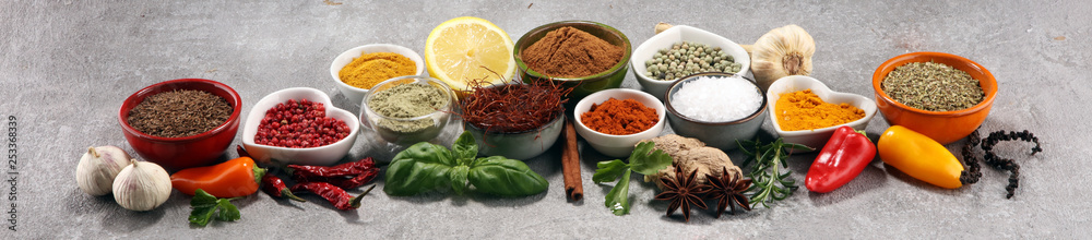 Spices and herbs on table. Food and cuisine ingredients. - obrazy, fototapety, plakaty 