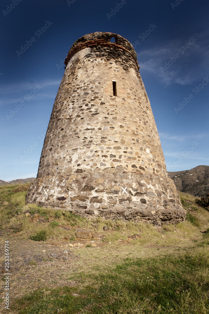 old stone watchtower in almunecar spain