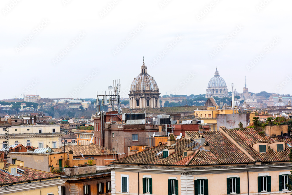city of Rome, the roof of the building, the dome of the Catholic churches on a cloudy day