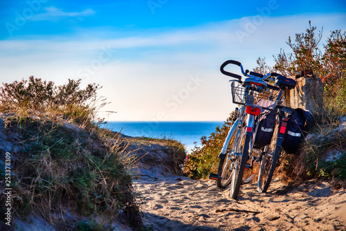 Fototapeta Naklejka Na Ścianę i Meble -  Dranske on the island of Rügen, Baltic sea. Bikes standing at the beach