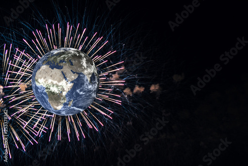 Planet earth with firework on black background. Elements of this image were furnished by NASA photo