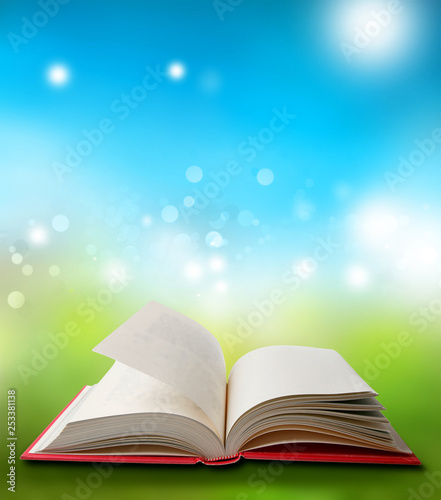 Open book and spring background