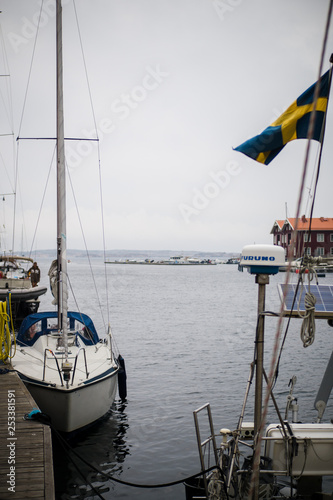 Beautiful little town of smögen in sweden, boats, model and flags