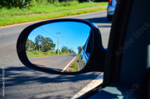 highway in the rearview mirror