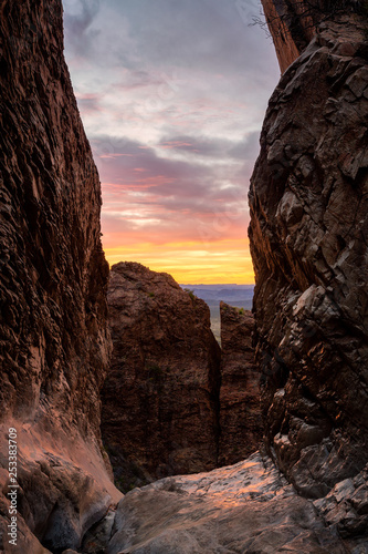 The sun sets at the bottom of the Window Trail in Big Bend National Park, Texas