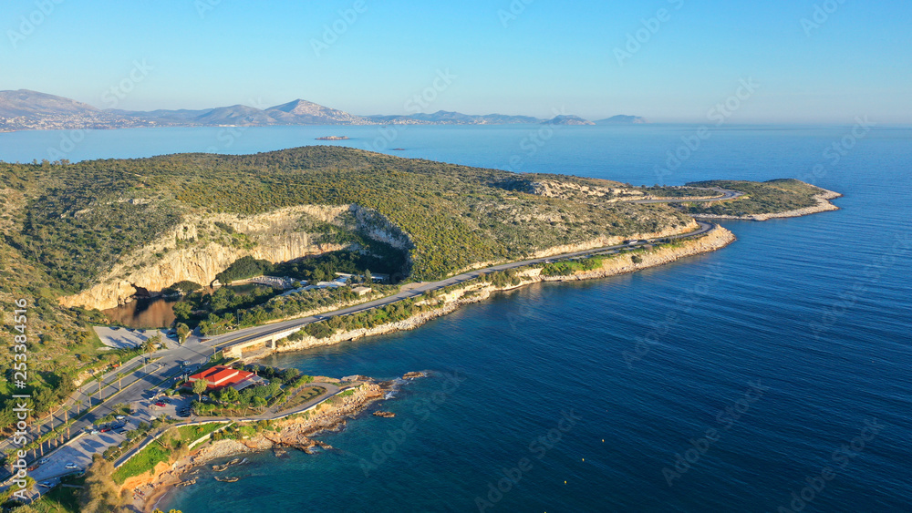 Aerial drone, bird's eye view photo from iconic lake Vouliagmeni famous for healing abilities, Athens riviera, Attica, Greece