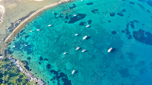 Aerial drone bird s eye photo of traditional fishing boat in island of Mykonos  Cyclades  Greece