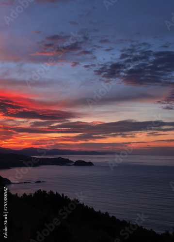 Sunset on the coast of Gipuzkoa with Getaria in the background  Basque Country