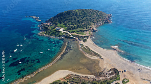 Aerial drone photo of famous small islet with picturesque chapel of Agios Nikolaos and small marina, Anavissos area, Attica, Greece photo