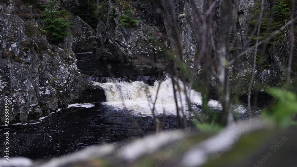 Beautiful small waterfall in the scottish countryside and woodland Forests Beautiful small waterfall in the scottish countryside and woodland Forests
