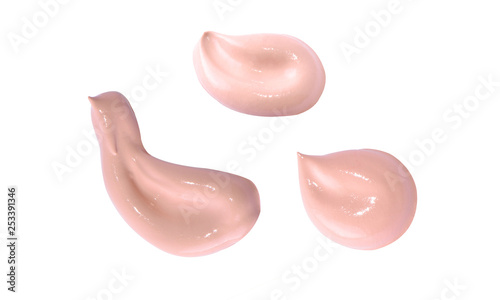 Liquid makeup foundations smear drop on white background. photo