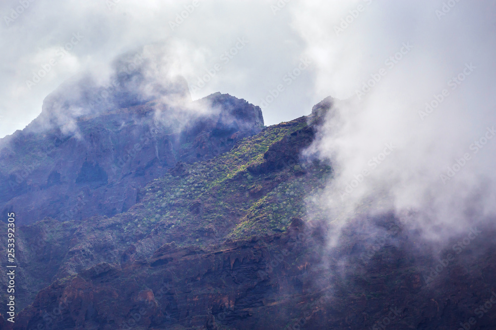 Mountain Landscape of the Masca Gorge. Beautiful views of the coast with small villages in Tenerife, Canary Islands Mountain Landscape of the Masca Gorge. Beautiful views of the coast with small villages in Tenerife, Canary Islands