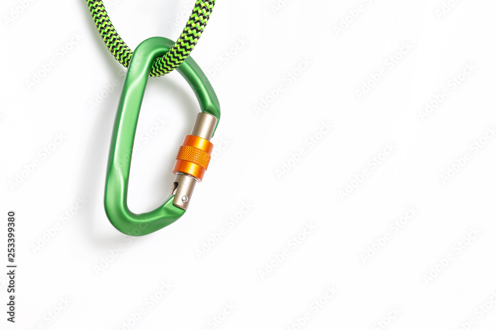 Colorful carabiner with rope isolated on white as outdoor recreation and teamwork trust concept Colorful carabiner with rope isolated on white as outdoor recreation and teamwork trust concept