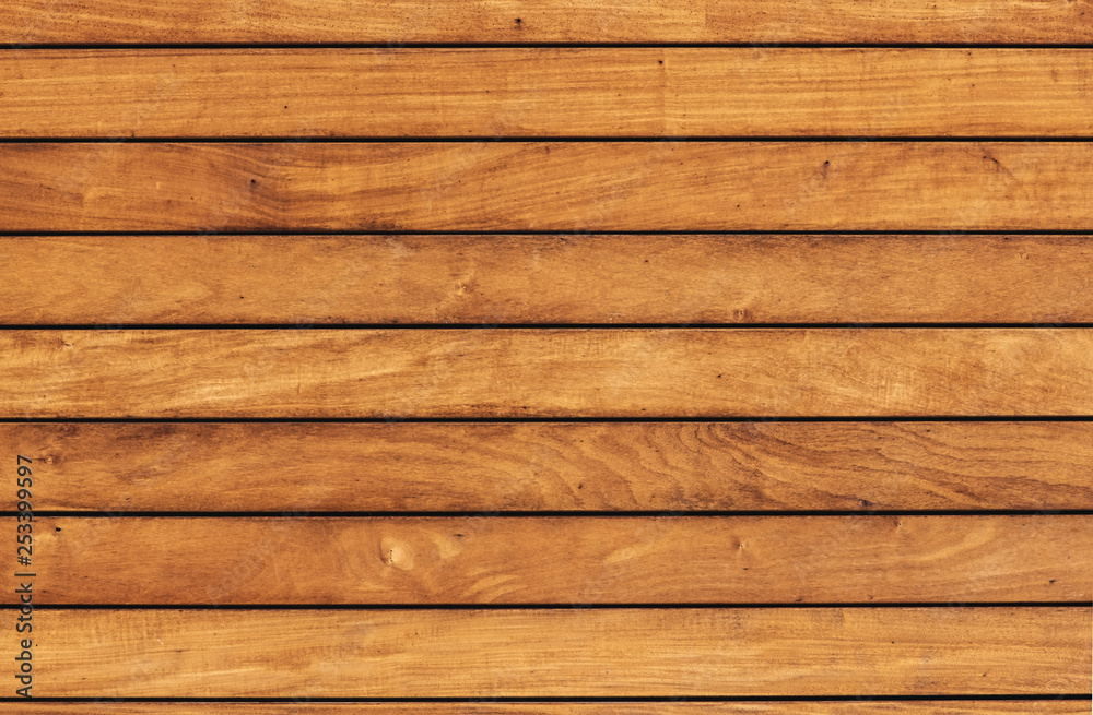 The texture of the pine boards. Horizontal wooden fence. The texture of the pine boards. Horizontal wooden fence.