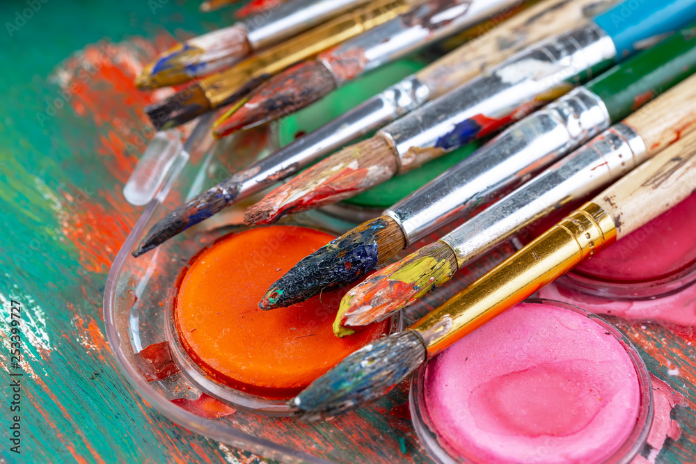 Paint brushes and paints for drawing. Paint brushes and paints for drawing.