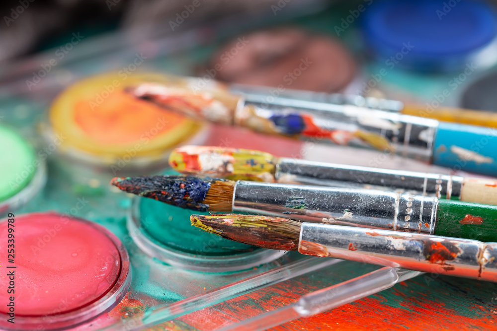 Paint brushes and paints for drawing. Paint brushes and paints for drawing.