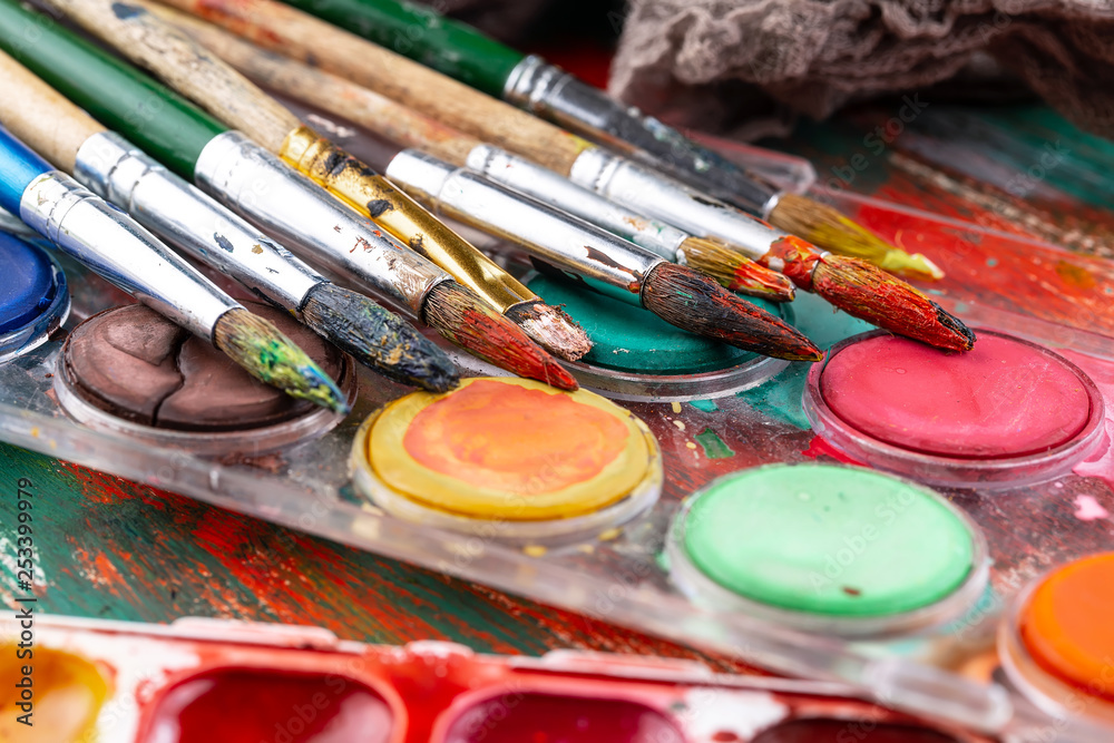 Paint brushes and paints for drawing. Paint brushes and paints for drawing.