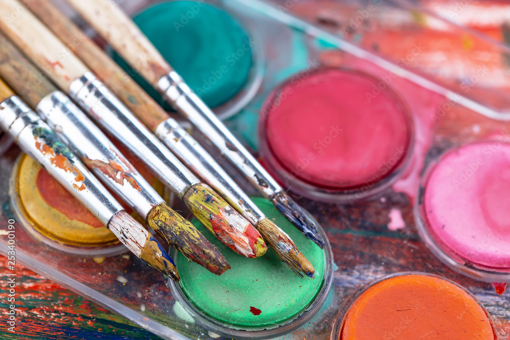 Paint brushes and paints for drawing. Paint brushes and paints for drawing.