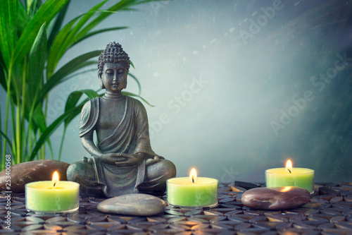 Buddha statue  on a grey background