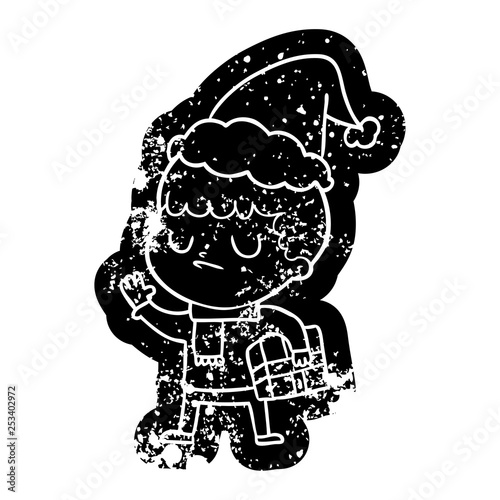 cartoon distressed icon of a grumpy boy wearing santa hat