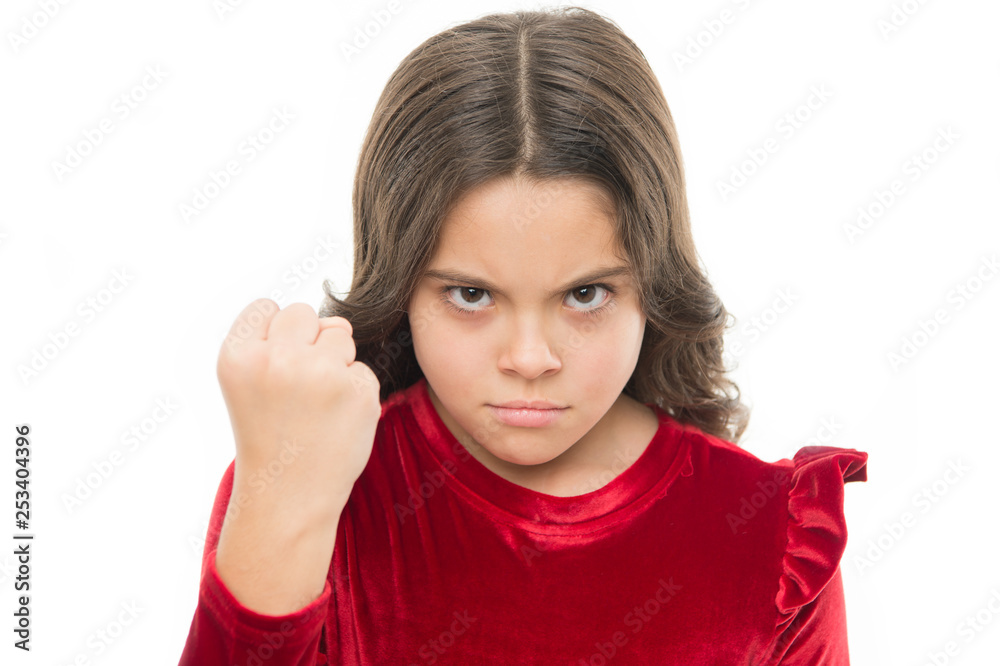Threatening with physical attack. Kids aggression concept. Aggressive girl threatening to beat you. Dangerous girl. You are warned. Girl kid threatening with fist isolated on white. Strong temper Threatening with physical attack. Kids aggression concept. Aggressive girl threatening to beat you. Dangerous girl. You are warned. Girl kid threatening with fist isolated on white. Strong temper