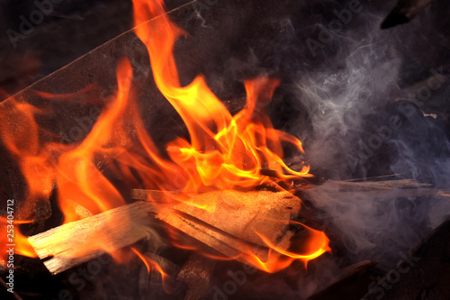 photography fire close-up. fire - an accident. paper and wood burning