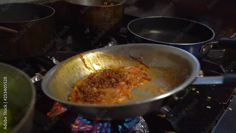 cooking in a steel pan cooking in a steel pan
