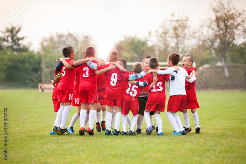 Young soccer players celebrating victory © marritch
