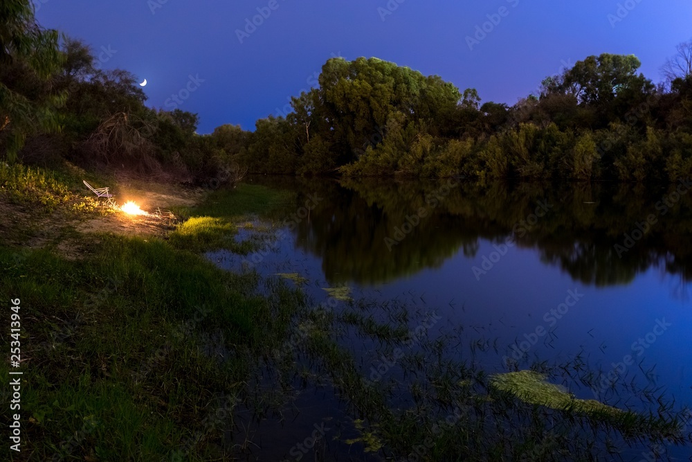 fireplace at river bank at night