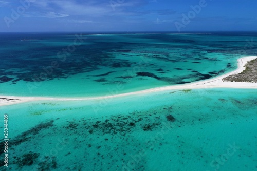 Caribbean sea, Los Roques, Venezuela: vacation on the blue sea and paradisiac beach. Vacation travel. Travel destination. Tropical travel. Great beach scenery. Beautiful landscape. © ByDroneVideos