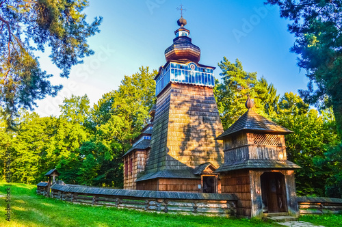 Beautiful little wooden church in the forest of Sanok Skansen, Poland