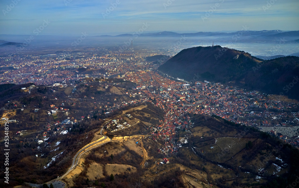 Panoramic view of the old town in the winter time, Aerial cityscape of Brasov city, Transylvania landmark in Brasov, Romania Panoramic view of the old town in the winter time, Aerial cityscape of Brasov city, Transylvania landmark in Brasov, Romania