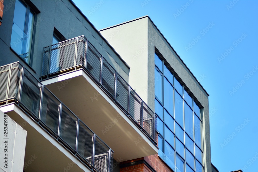 Modern condo building with huge windows Modern condo building with huge windows