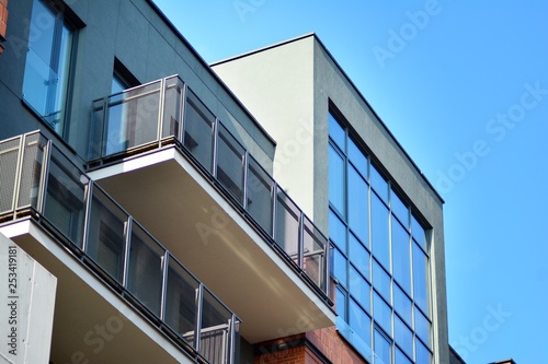 Modern condo building with huge windows © Grand Warszawski