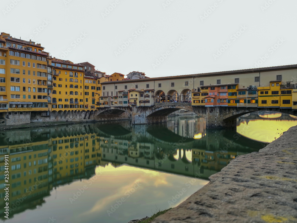 florence,tuscany/Italy 24 february 2019 : the ponte vechio ,the most famous landmark of the city,thousands of people are crossing this bridge every day