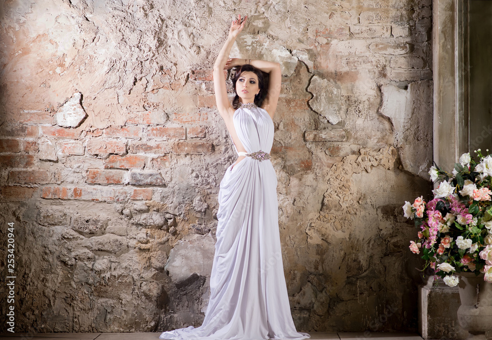 Greek style woman in long white dress. Fashion model Stock Photo | Adobe  Stock