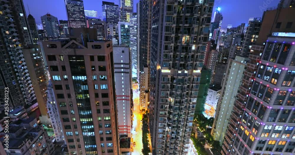 Modern city at night. Hong Kong futuristic architecture and urban cityscape aerial 4K panorama Modern city at night. Hong Kong futuristic architecture and urban cityscape aerial 4K panorama