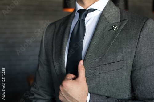 Detail of man in expensive custom tailored suit
