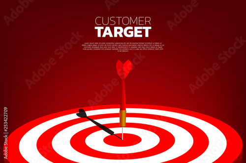 dart arrow hit the center of dartboard . Business Concept of marketing target and customer.Company vision mission and goal.