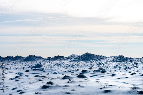 Frozen peaks on an ice covered Lake Michigan.