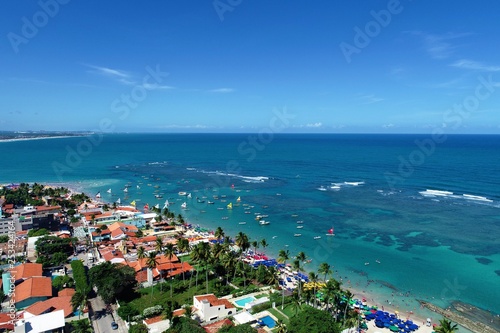 Aerial view of Porto de Galinhas's Beach, Pernambuco, Brazil: Vacation on the paradisiac beach with fantastics natural pools. 