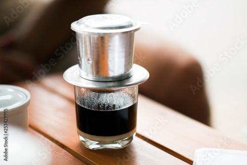 Vietnamese Coffee - Hot milk coffee with condensed milk in Vietnam style. Traditional Vietnamese drink